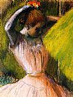 Edgar Degas Canvas Paintings - Ballet Corps Member Fixing Her Hair